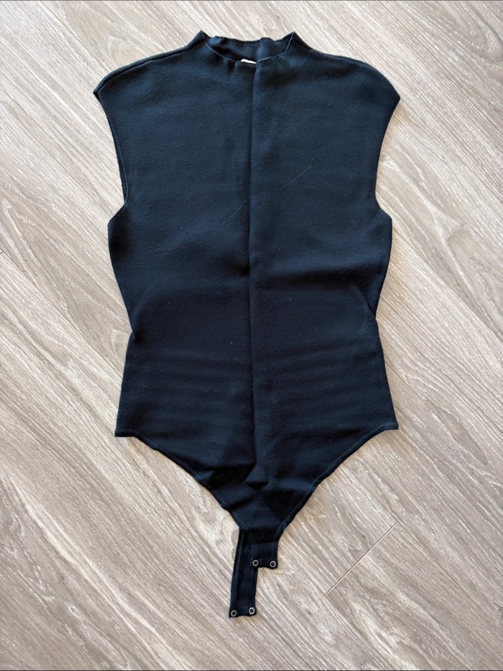 Abercrombie Black Sleeveless One-Piece Bodysuit with mock neck